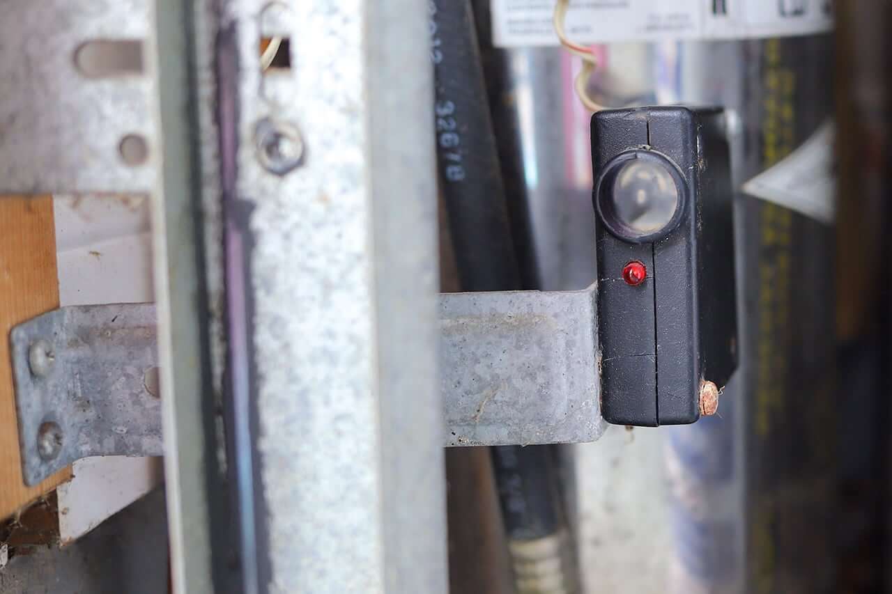 dirty garage door sensor