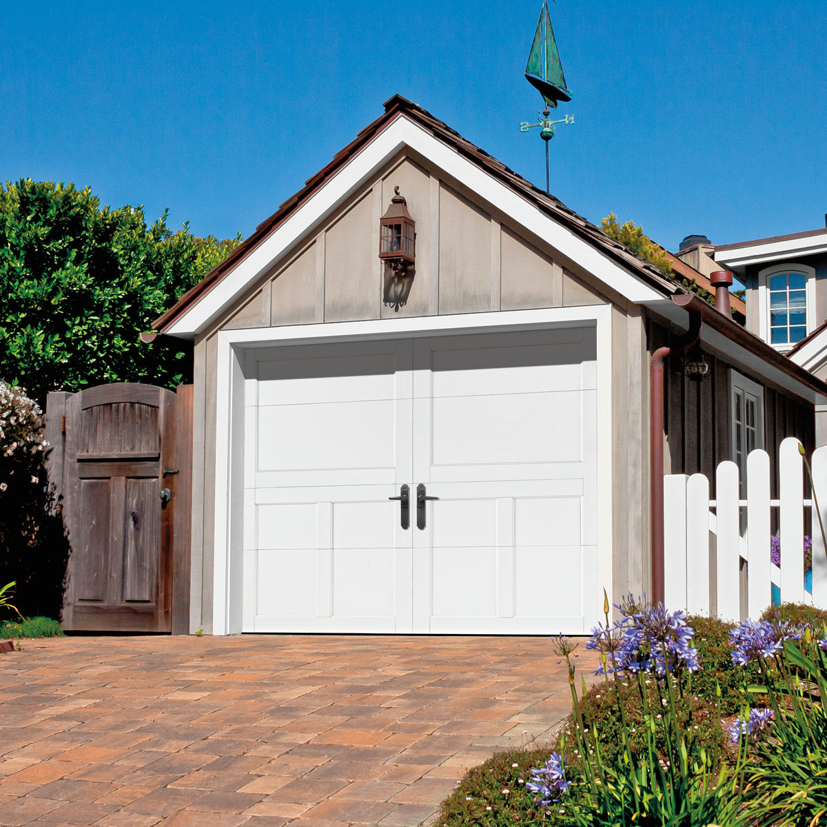 White steel single garage door with square panel design