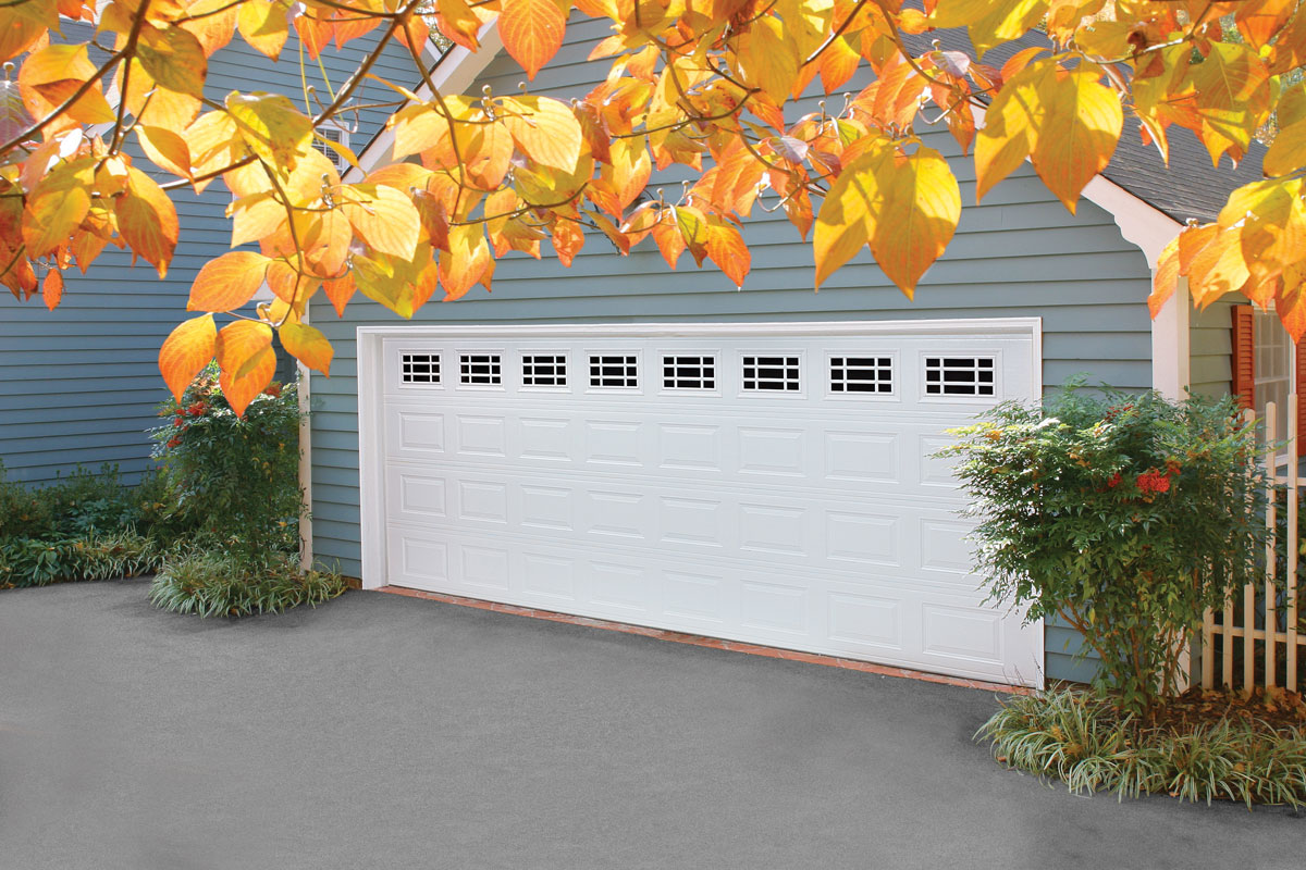 A short panel glazed true white steel double garage door.