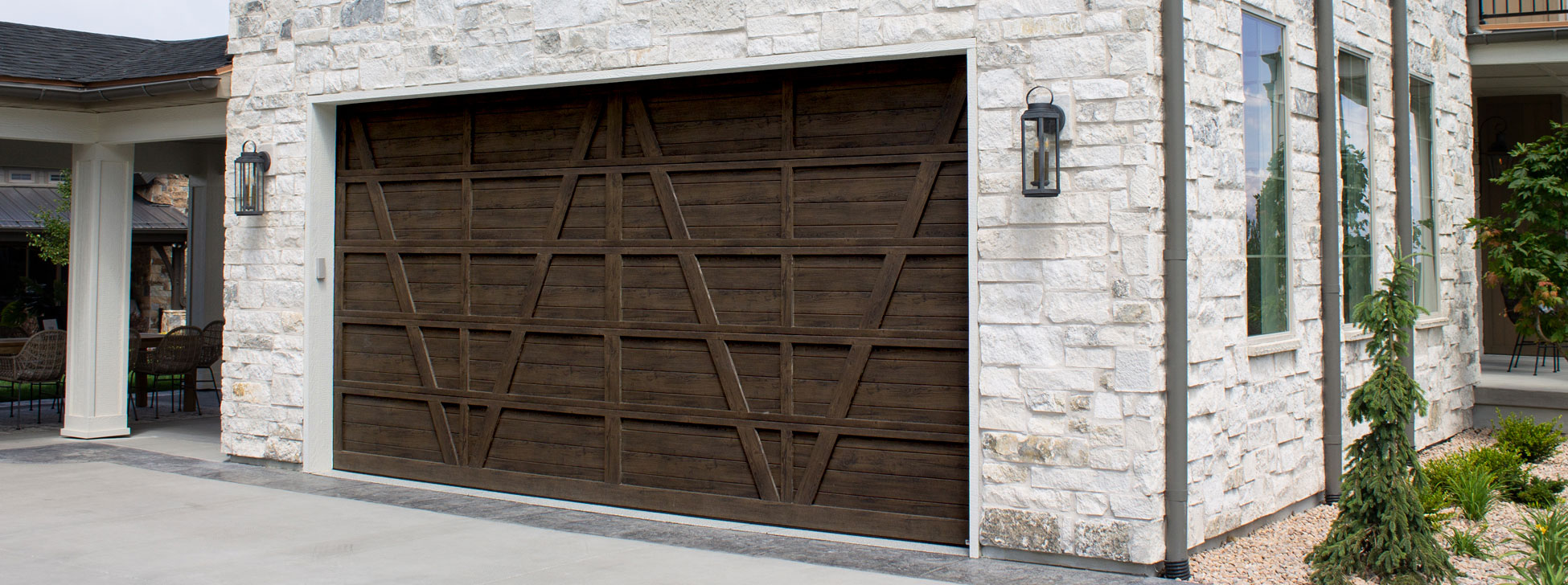 An image of a Martin steel Pinnacle garage door with design elements.